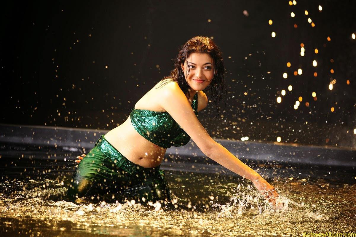 Kajal Agarwal Hot Navel Show In Green Wet Dress Pictures4