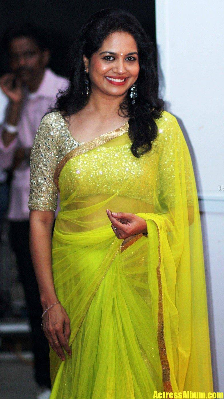 Singer Sunitha Long Hair Stills In Transparent Yellow Saree - Actress Album