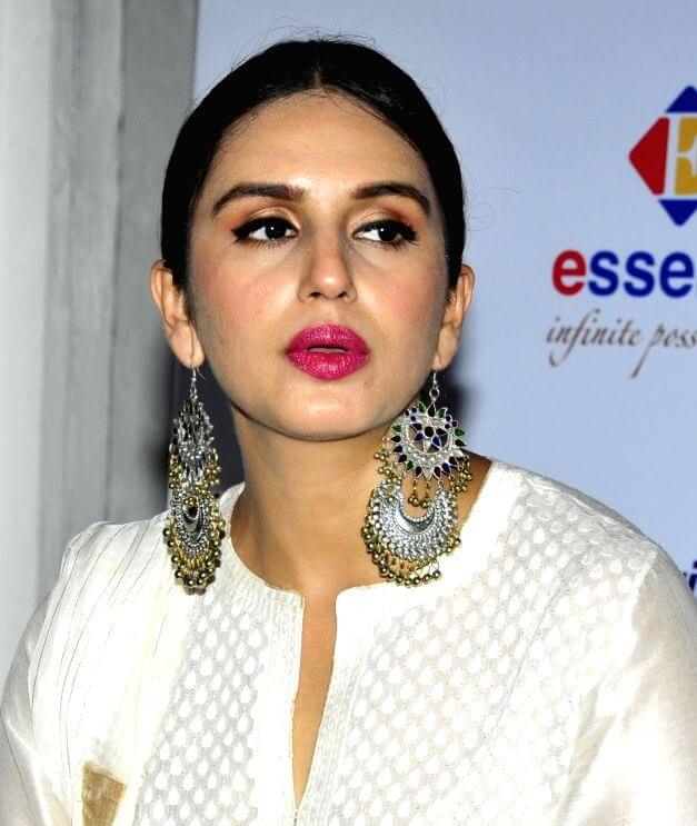 Indian Actress Huma Qureshi Beautiful Looking Face Photos In White Dress