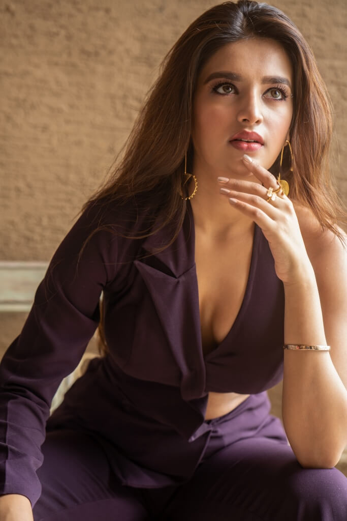 Nidhhi Agerwal Hot In Violet Dress