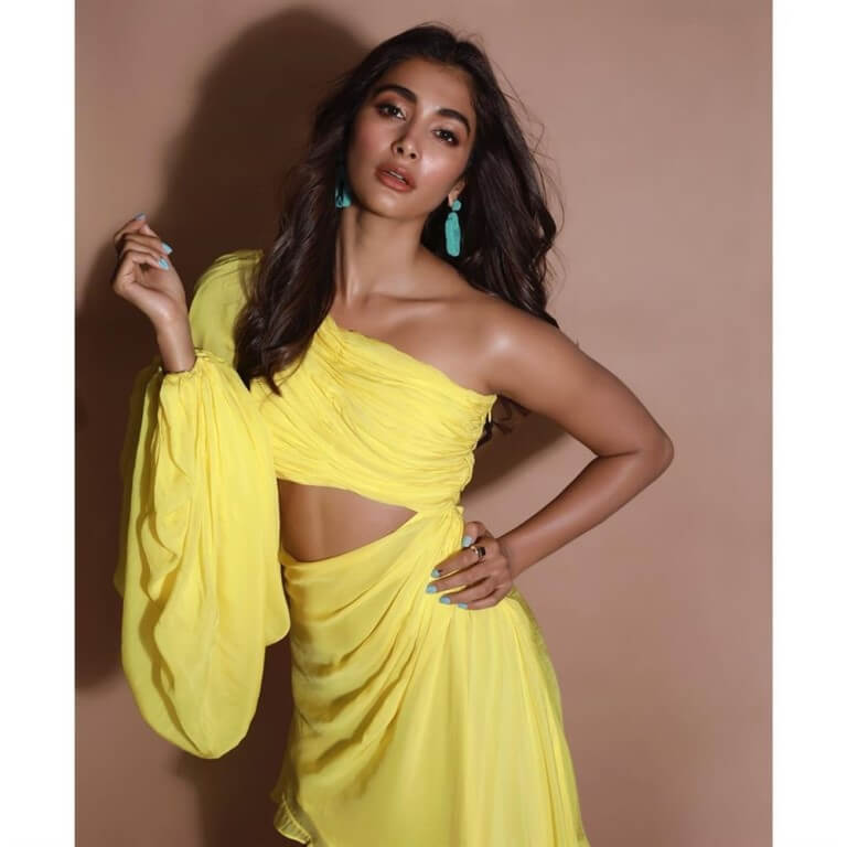Pooja Hegde Exposing Photos In Yellow Dress